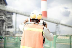 problem solving and decision making a man wearing safety equipment talking on the radio